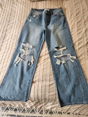 High-Rise Light Blue Wide-Leg Distressed Jeans for Women